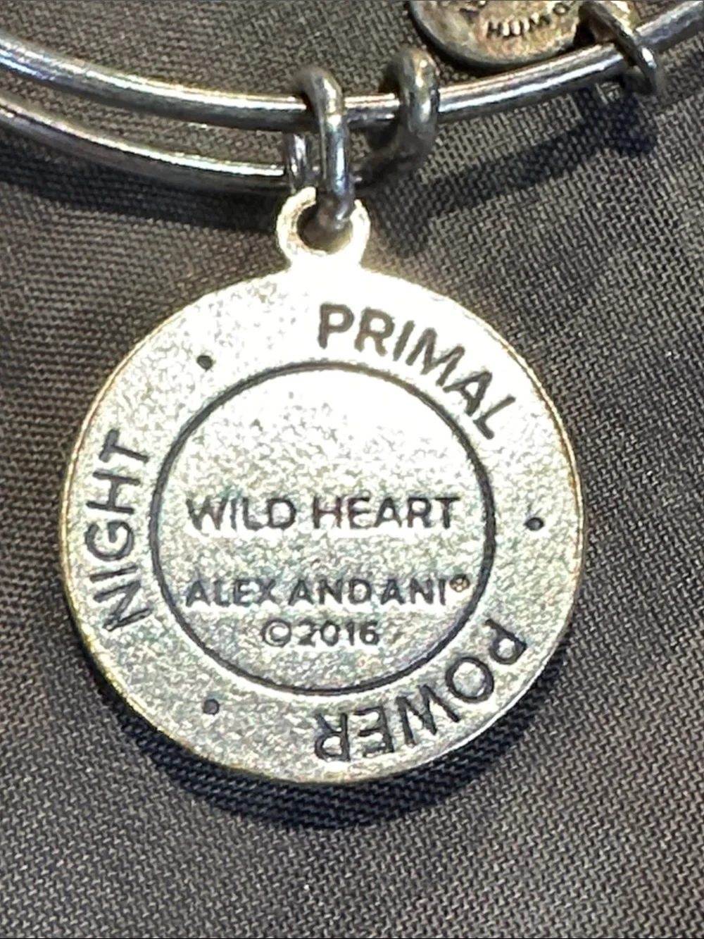 Alex and Ani Wild Heart Cat pendant charm on bracelet